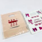 ⁦اكياس هدايا وتوزيعات خلوط مقاس 25.5*19.5 سم عدد 100 كيس⁩ - الصورة ⁦3⁩