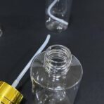 ⁦عبوة بلاستيك راقية للـ زيوت واللوشن وكريمات التجميل رأس ذهبي 80 مل⁩ - الصورة ⁦2⁩