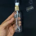 ⁦عبوة بلاستيك للزيوت واللوشن وكريمات التجميل عبوة 100 مل رأس ذهبي⁩ - الصورة ⁦3⁩