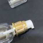 ⁦عبوة بلاستيك للزيوت واللوشن وكريمات التجميل عبوة 100 مل رأس ذهبي⁩ - الصورة ⁦2⁩