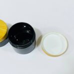 ⁦علب بلاستيك لون اسود غطاء ملون خشبي متعددة الاستعمالات عبوة 100/150 مل⁩ - الصورة ⁦5⁩