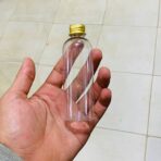 ⁦دستة علب شفافة بلاستيك عبوة 100 مل عدد 12 شيشة مغطة ذهبية⁩ - الصورة ⁦2⁩