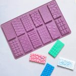 قالب صنع الشكلاطة 12 قطعه توزيعات الاطفال من الشوكلاتة والحلوى وديكور الكعك MA93