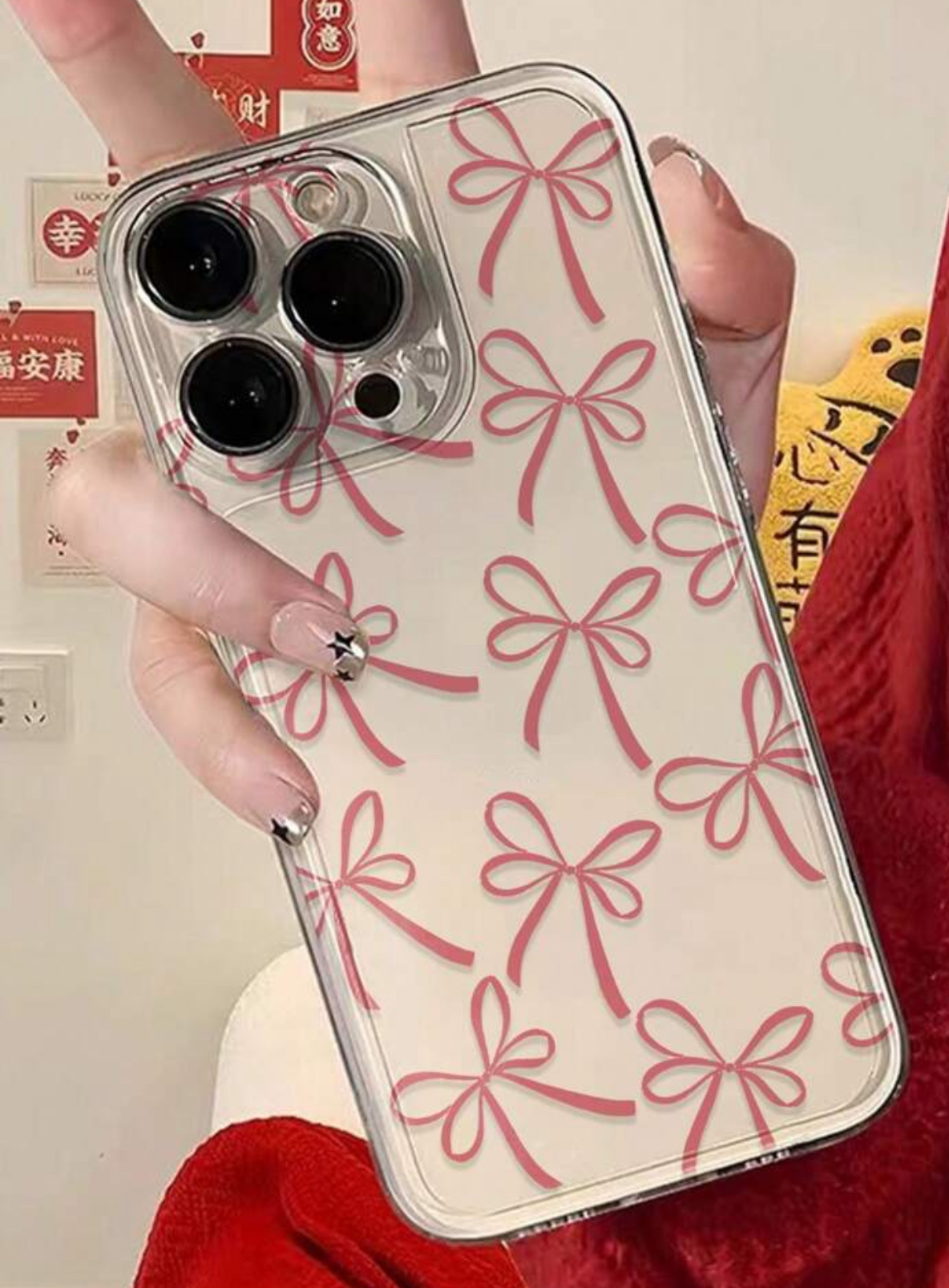IMG_2862 كفر هاتف ايفون شفاف بنقش فيونكة وردية ترند WFHM77 - الصورة 1