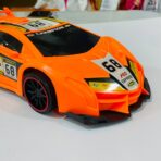 ⁦لعبة سيارة لامبرغيني دفع للأطفال ، لون برتقالي مميز ، بدون بطاريات⁩ - الصورة ⁦4⁩