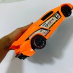 ⁦لعبة سيارة لامبرغيني دفع للأطفال ، لون برتقالي مميز ، بدون بطاريات⁩ - الصورة ⁦3⁩