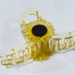 ⁦مساكة شعر ترند راقية وردة عباد الشمس لون عسلي / برتقالي & أسود⁩ - الصورة ⁦4⁩