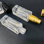 ⁦دستة 12 عبوة زجاجية فاخرة تقسيم العطور 5 مل ، 3 ألوان فضي / ذهبي / أسود⁩ - الصورة ⁦2⁩