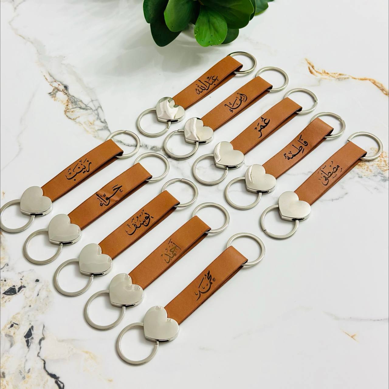 photo_1_2025-07-28_21-17-03 ميدالية مفاتيح جلد منقوش عليها الاسم - الصورة 1