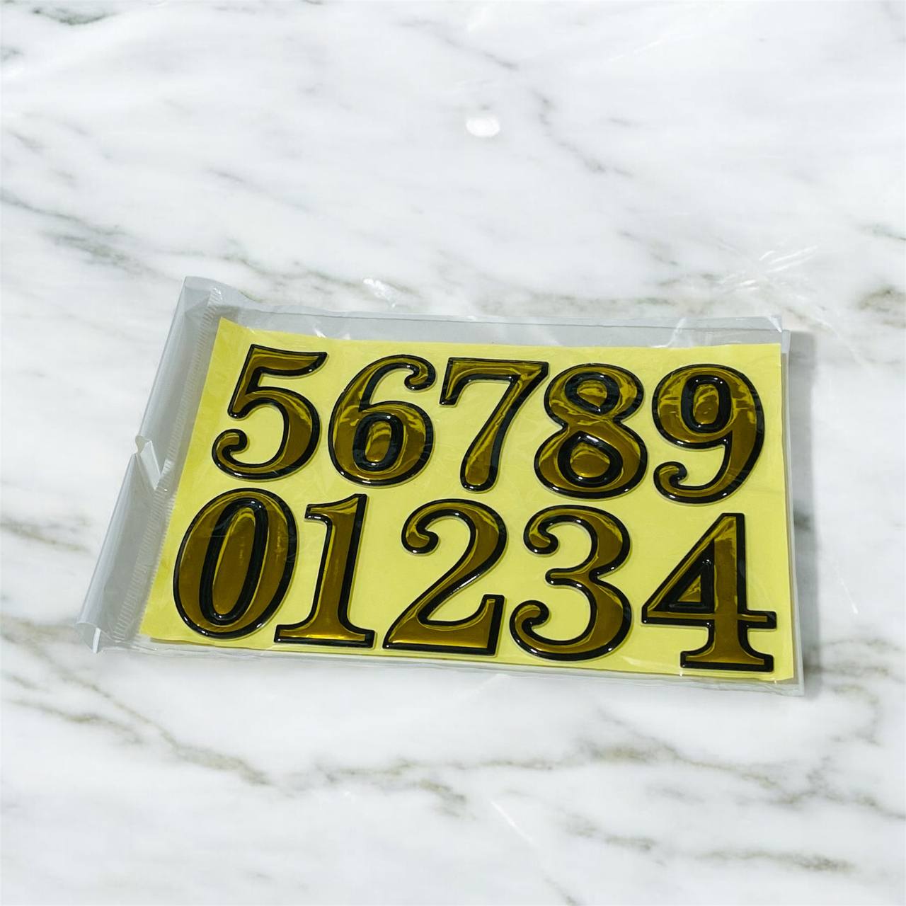 photo_2_2025-07-26_23-01-53 مجموعة أرقام ذهبية لاصقة متعدد الاستعمالات ، مناسبة للأبواب والغرف والاشغال - الصورة 1