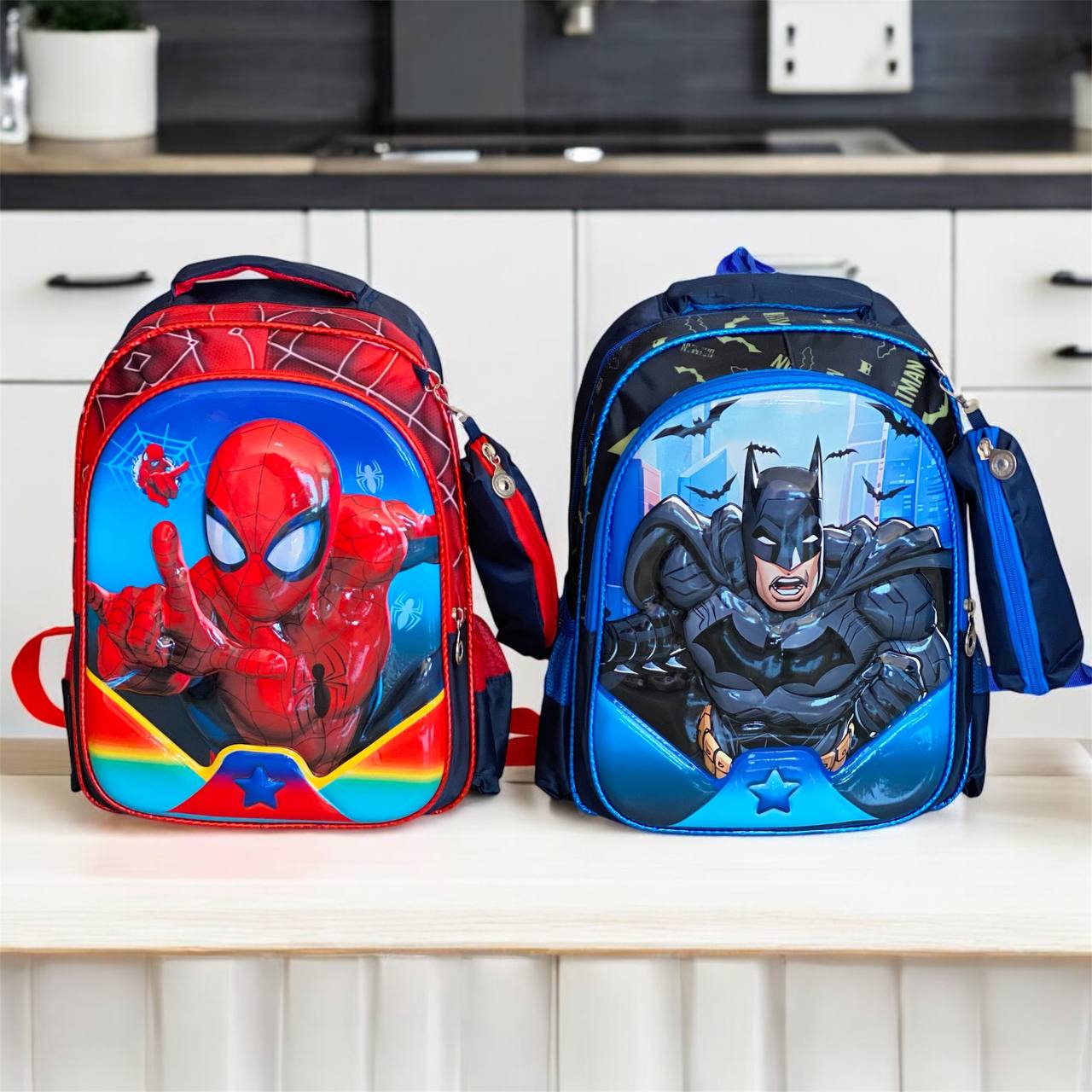 photo_4_2025-08-06_13-00-22 حقيبة مدرسية صف اول / روضة ، مع مقلمة شخصية سبايدرمان - بات مان - الصورة 1