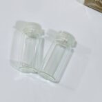 ⁦دستة 100 قنينة ، عبوات زجاجية 12 مل غطاء ضغط ، لتعبئة العطورات المركزة ومواد العناية والتجميل والزيوت⁩ - الصورة ⁦5⁩